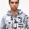 Avslappnad hoodie med monogram över hela plagget Avslappnad hoodie med monogram över hela plagget