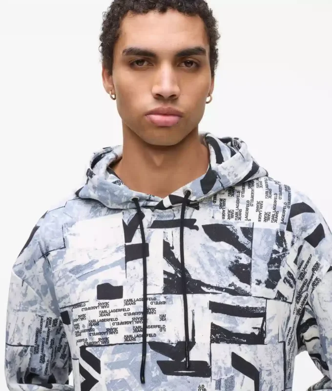 Avslappnad hoodie med monogram över hela plagget Avslappnad hoodie med monogram över hela plagget