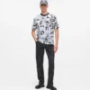 Avslappnad T-shirt med monogram över hela plagget Avslappnad T-shirt med monogram över hela plagget