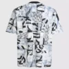Avslappnad T-shirt med monogram över hela plagget Avslappnad T-shirt med monogram över hela plagget