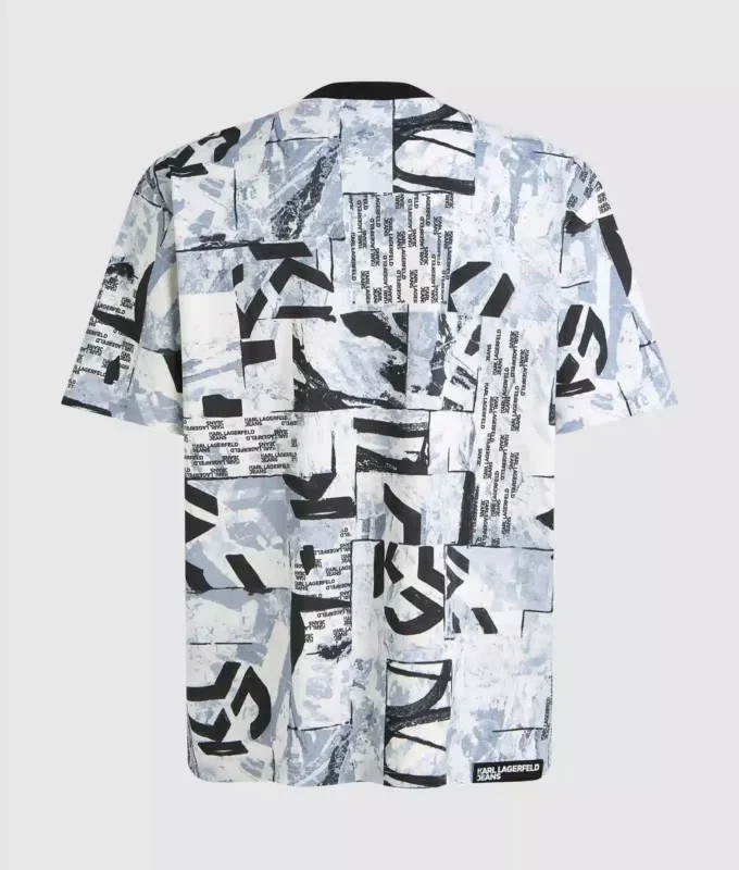 Avslappnad T-shirt med monogram över hela plagget Avslappnad T-shirt med monogram över hela plagget