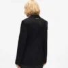 Blazer med bälte och kontrasterande revers Blazer med bälte och kontrasterande revers