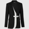 Blazer med bälte och kontrasterande revers Blazer med bälte och kontrasterande revers