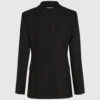 Blazer med bälte och kontrasterande revers Blazer med bälte och kontrasterande revers