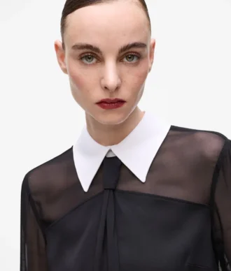Blus med knytdetalj