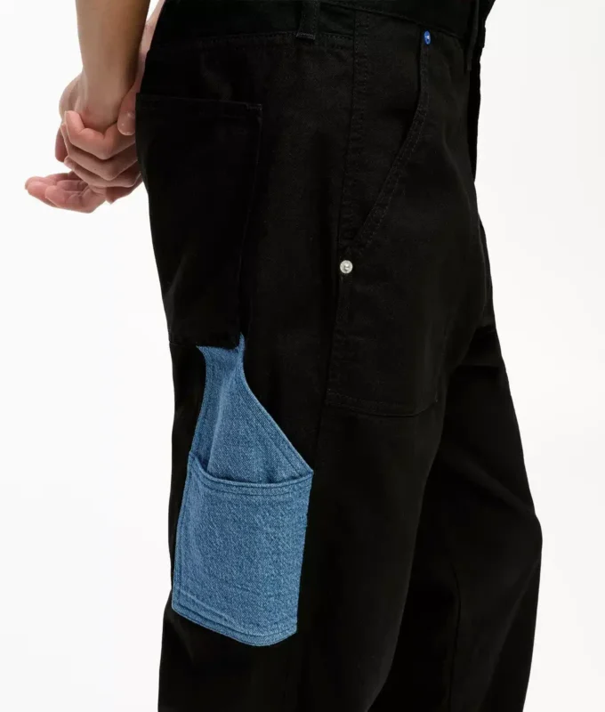 Byxor i denim med fickor Byxor i denim med fickor