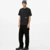 Byxor i denim med fickor Byxor i denim med fickor