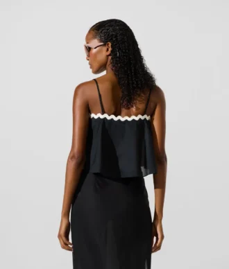 Croppt strandtop med vågig kant