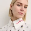 DISNEY X KL BLUS MED ALL-OVER-TRYCK DISNEY X KL BLUS MED ALL-OVER-TRYCK