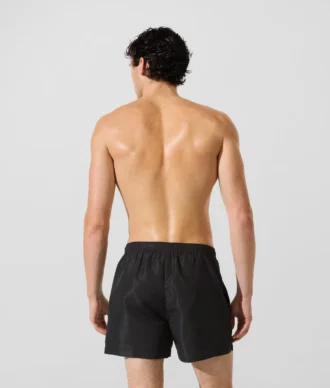Ikon metalliska boardshorts