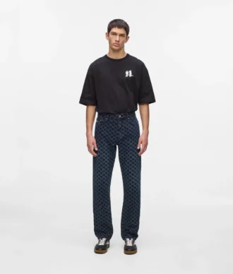 Jeans med monogram över hela ytan