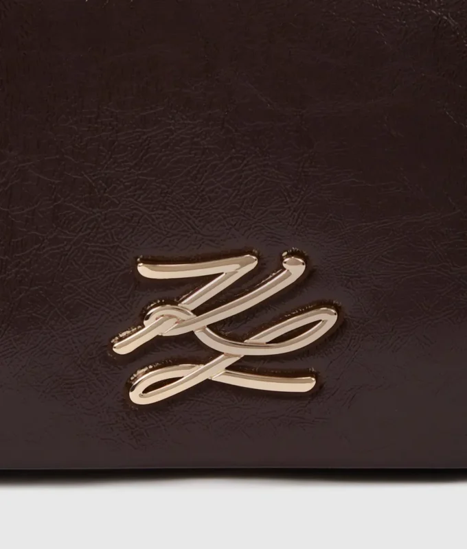 K/Autograph glansig crossbody-väska