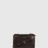 K/Autograph glansig crossbody-väska