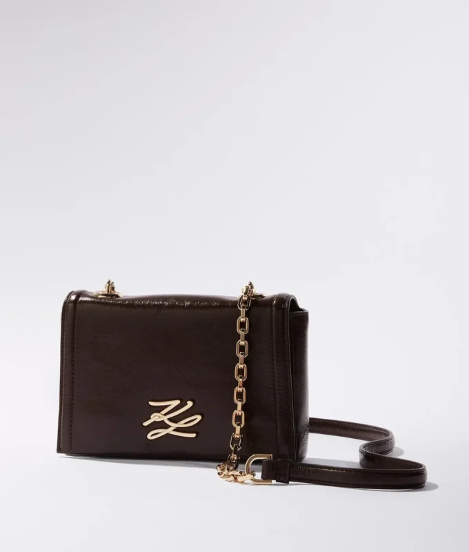 K/Autograph glansig crossbody-väska