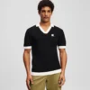 MONOGRAM-STICKAD POLOTRÖJA MONOGRAM-STICKAD POLOTRÖJA