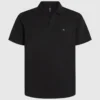 Polo med monogramnål Polo med monogramnål