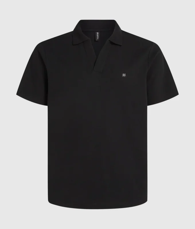 Polo med monogramnål Polo med monogramnål