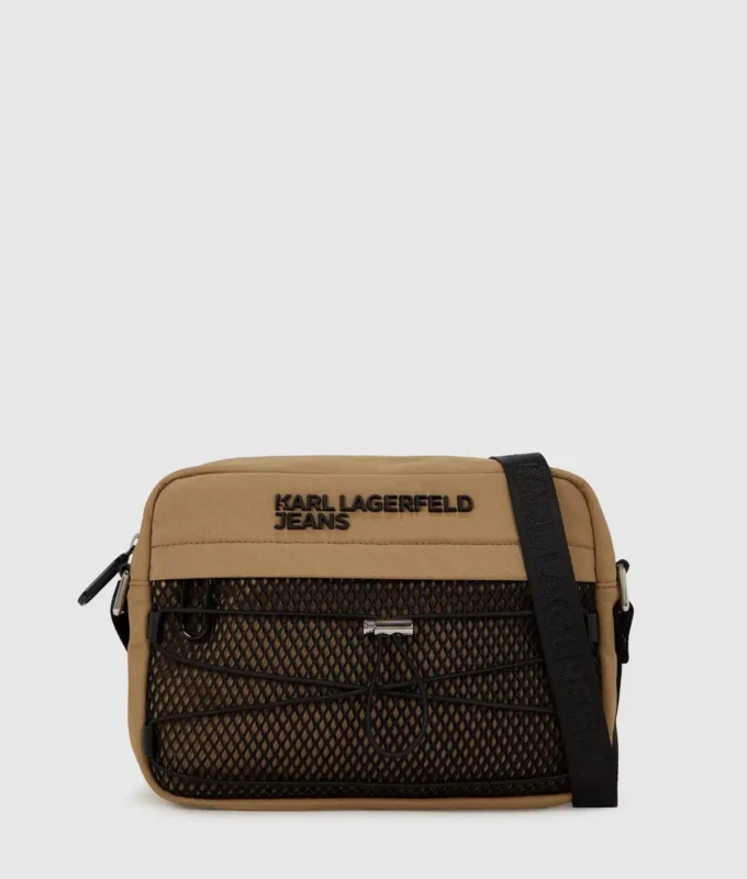 Praktisk crossbody-väska med dragsko Praktisk crossbody-väska med dragsko