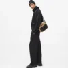 Praktisk crossbody-väska med dragsko Praktisk crossbody-väska med dragsko