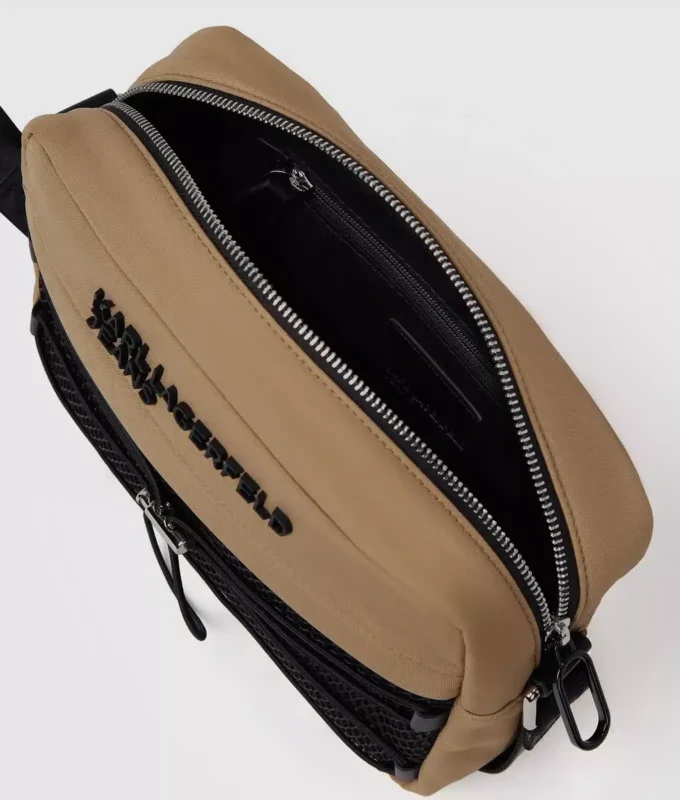 Praktisk crossbody-väska med dragsko Praktisk crossbody-väska med dragsko