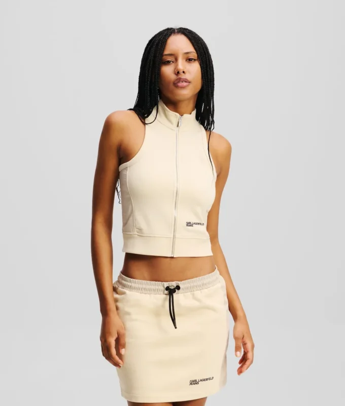 ÄRMÖS TOPP MED ZIP-FRONT ÄRMÖS TOPP MED ZIP-FRONT