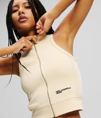 ÄRMÖS TOPP MED ZIP-FRONT