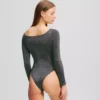 Signatur bodysuit med långa ärmar Signatur bodysuit med långa ärmar