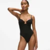 Signaturbodysuit med hög benöppning