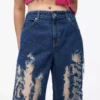 Sliten jeans med medelhög midja Sliten jeans med medelhög midja