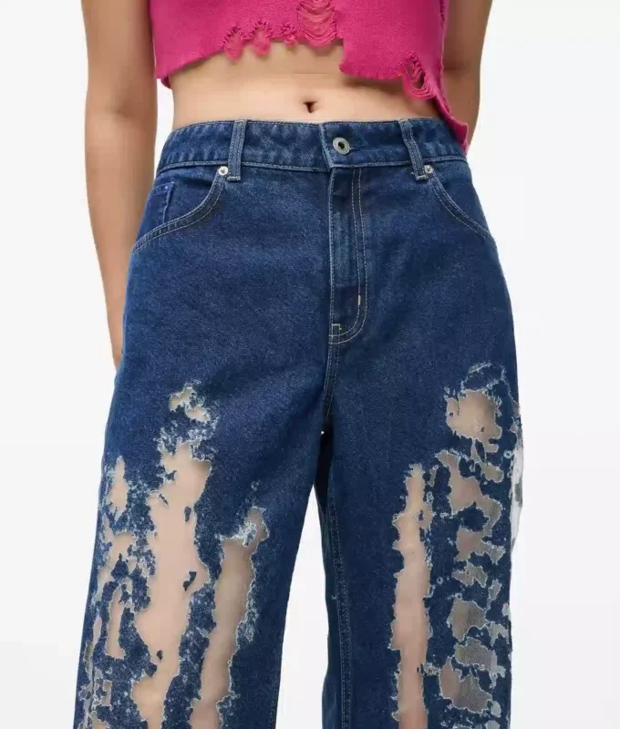 Sliten jeans med medelhög midja Sliten jeans med medelhög midja