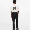 Smal jeans med metalliska detaljer