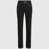 Smal jeans med metalliska detaljer
