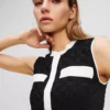 STRICKAD TOPP MED KONTRASTERANDE PIPING STRICKAD TOPP MED KONTRASTERANDE PIPING