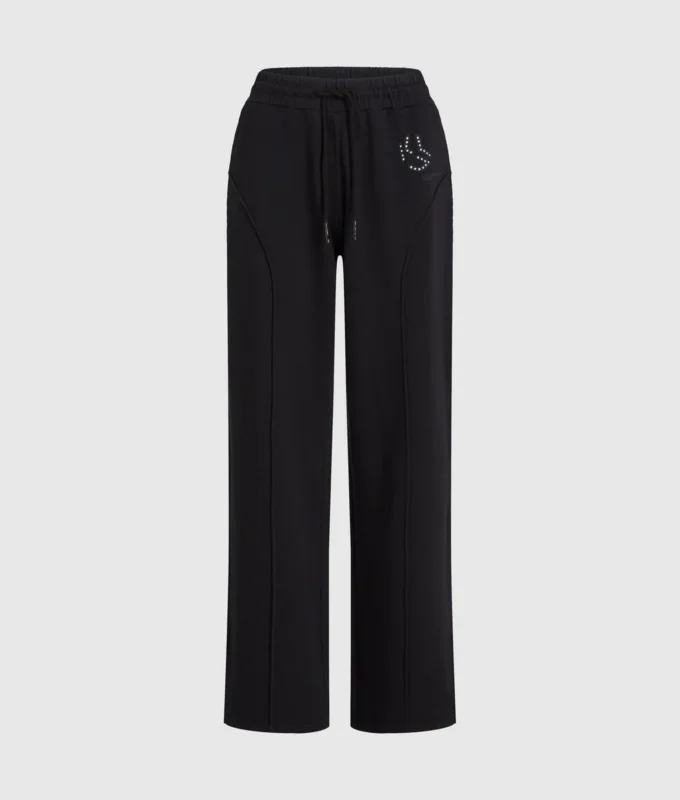 Sweatpants med nitar och monogram