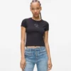 T-shirt med nitar och monogram T-shirt med nitar och monogram