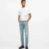 Tapered jeans med färgstänk