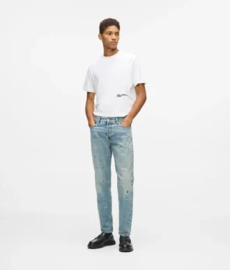 Tapered jeans med färgstänk