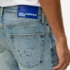Tapered jeans med färgstänk