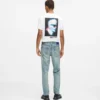 Tapered jeans med färgstänk