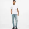 Tapered jeans med färgstänk