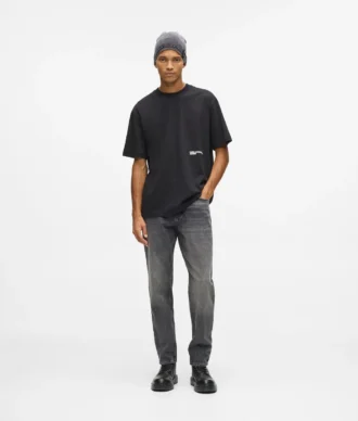 Vintage-tvättade tapered jeans